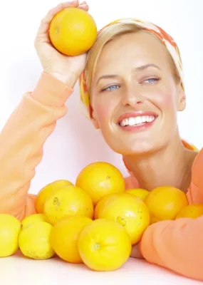 femeie-cu-portocale