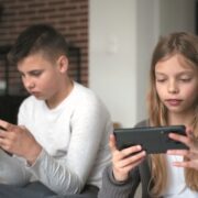 medium shot kids with devices
