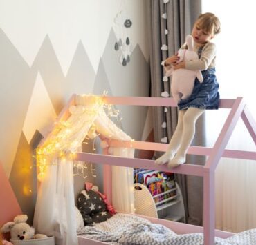 close up child playing her room